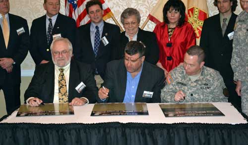 People signing Community Covenant